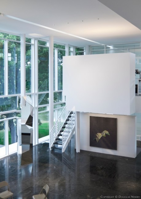 Richard Meier-designed home allows views to rooms on both levels of home and to gardens surrounding home.