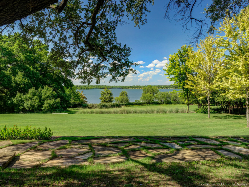 Four acres with the home on top of the hill that overlooks White Rock Lake in three directions