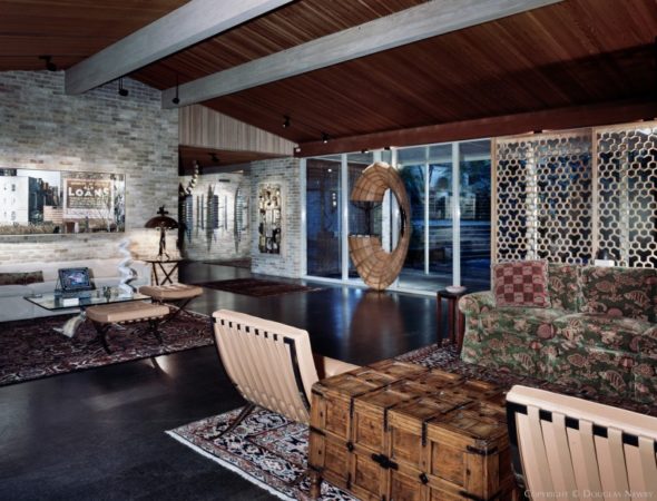 This Texas Modern home became a personal gallery of Texas art including a Jomo board by artist David McManaway.
