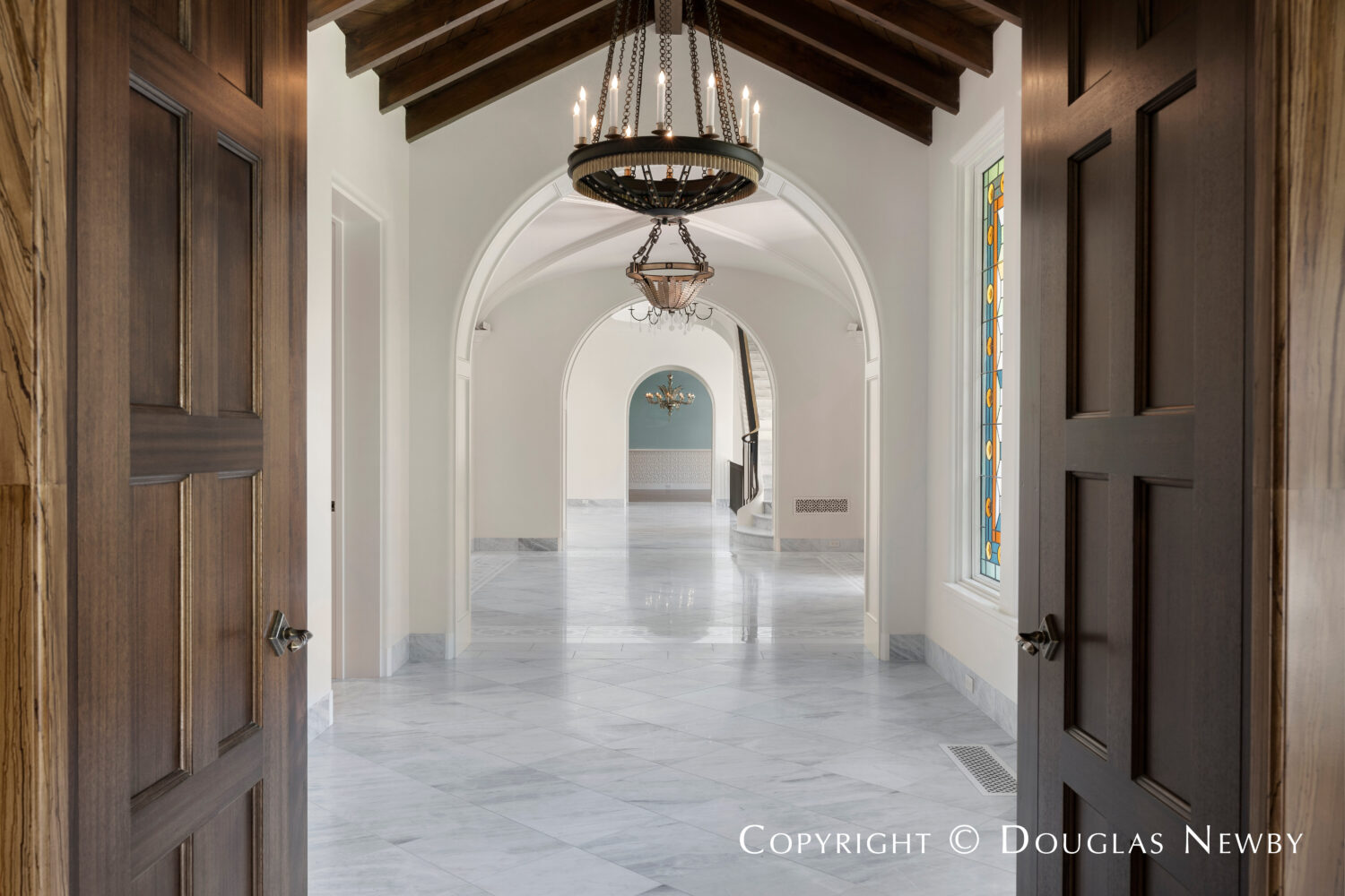 Hallway that traverses the width of the house at 4400 Belfort Place in Highland Park, Dallas, Texas. 
